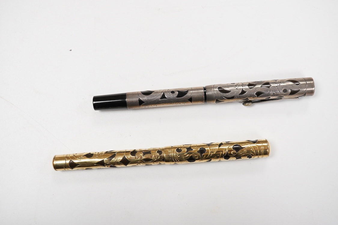 A Swan MT & Co. sterling silver filigree eyedropper along with similar gold filled example